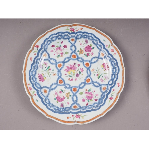 126 - Four Chinese famille rose shaped edge plates with floral spray and blue twisted decoration, 9