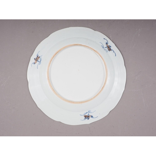 126 - Four Chinese famille rose shaped edge plates with floral spray and blue twisted decoration, 9