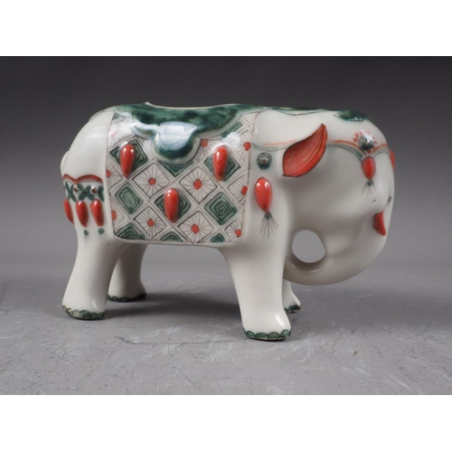 127 - A Chinese polychrome decorated elephant, 4 1/2