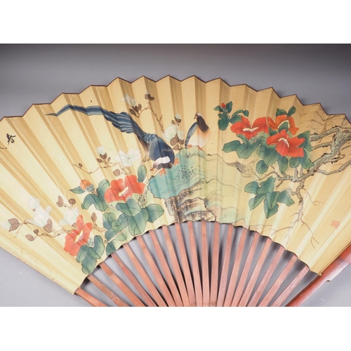 134 - A Japanese fan with painted bird and flower decoration, 34 3/4