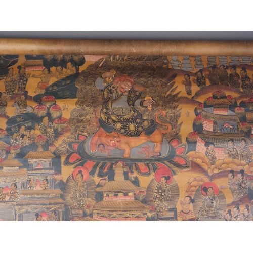 141 - A Tibetan? silk and painted silk scroll with Thangka design, 23 3/4