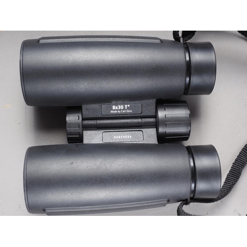 144 - A pair of Carl Zeiss 8 x 30 Conquest binoculars, in travelling case