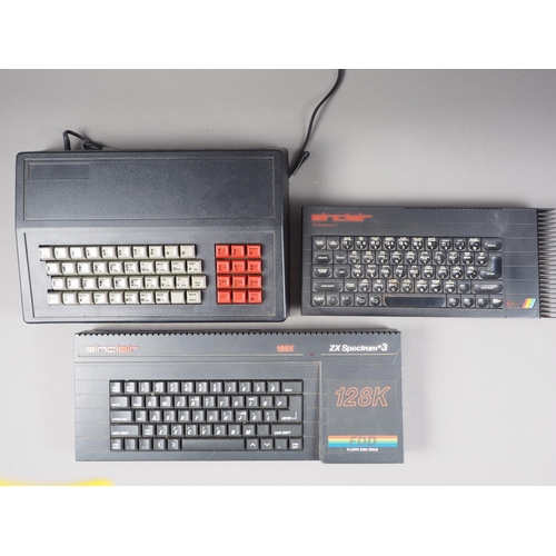 153 - A Sinclair 128k ZX Specturm+3, a Sinclair 128K ZX Spectrum+ and another