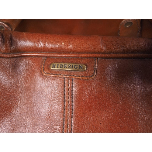 223 - A brown leather Hidesign overnight bag, 21 1/2