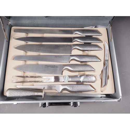 244 - An incomplete set of Maybach by Imhoff culinary knives, in metal case