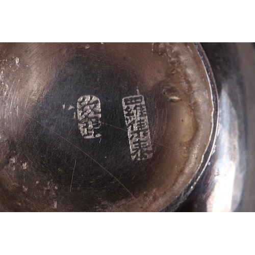 299 - A Chinese white metal double table salt, formed as two peaches, 3 7/8