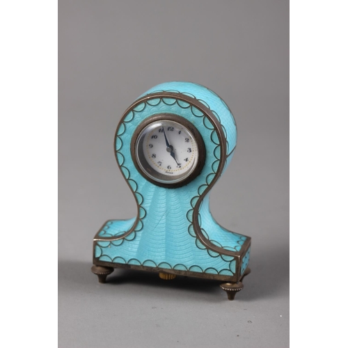 305 - A white metal, gilt and blue enamelled desk clock, stamped 