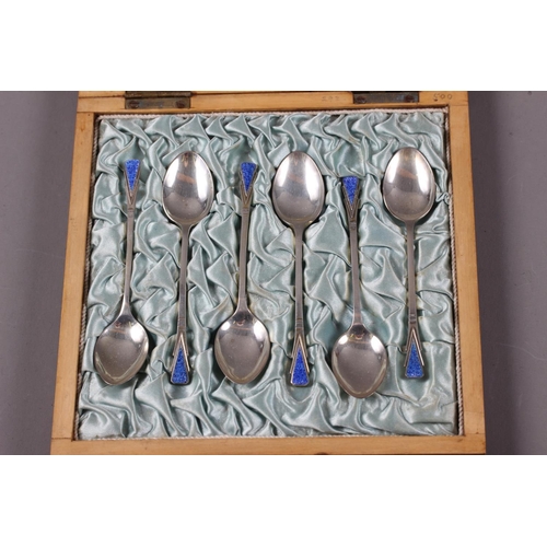 310 - A set of six Art Deco silver and blue enamel coffee spoons, in silk lined mahogany box