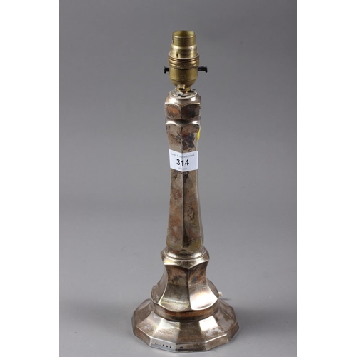 314 - A silver table lamp with weighted base, 13 1/2