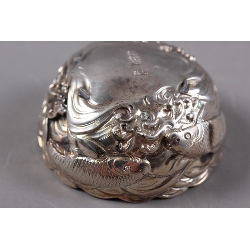 316 - A Japanese silver miniature bowl, decorated koi carp, and a Chinese silver-handled button hook with ... 