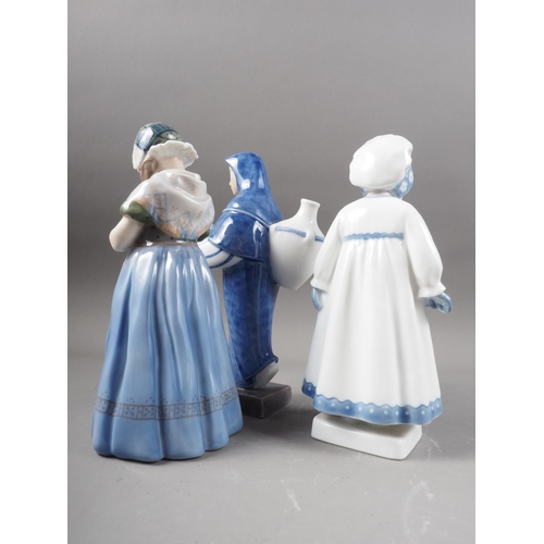 34 - Two Royal Copenhagen figures, woman with water jugs (4357), girl with plait (1223) and a Bing & ... 