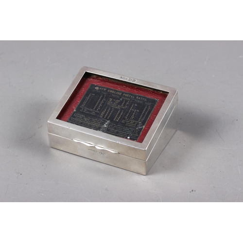 349 - A silver stamp box with red leather interior