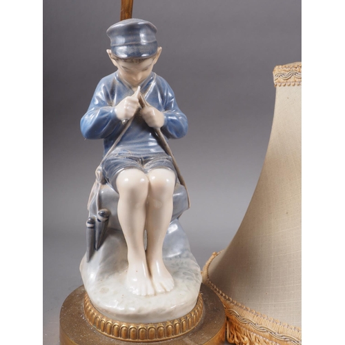 36 - A Royal Copenhagen figure, boy cutting a stick (905), mounted as a table lamp