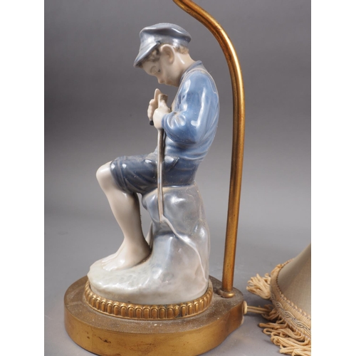 36 - A Royal Copenhagen figure, boy cutting a stick (905), mounted as a table lamp