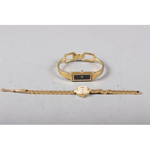 382 - A lady's rolled gold Regency manual wind bracelet watch with silvered dial and Arabic and baton nume... 