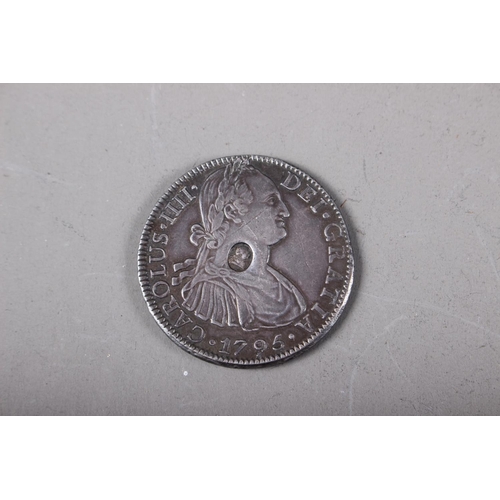 411 - A Spanish Carolus IIII silver dollar with oval countermark