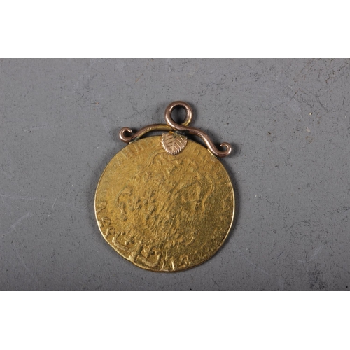 413 - A George III gold guinea, dated 1783 (hard mounted)