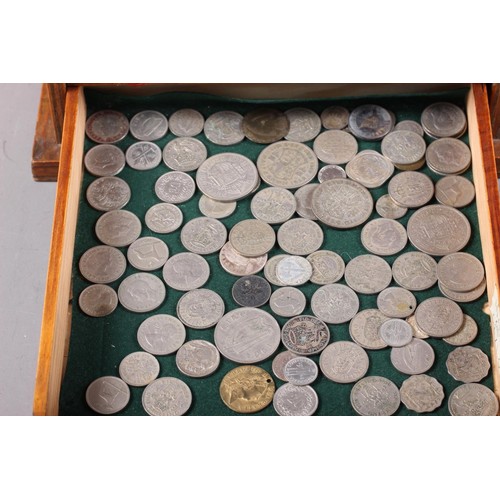 421 - A collector's coin chest, containing a selection of British and world coins