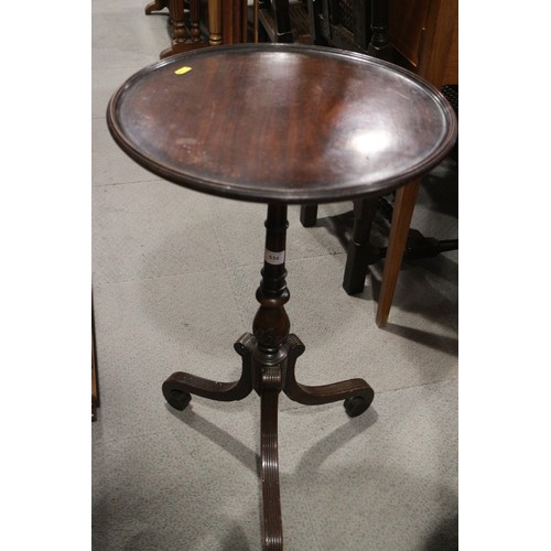 534 - A late 19th century mahogany circular tray top occasional table, on turned and tripod splay supports... 