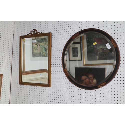 603 - A circular bevel edged wall mirror, 15