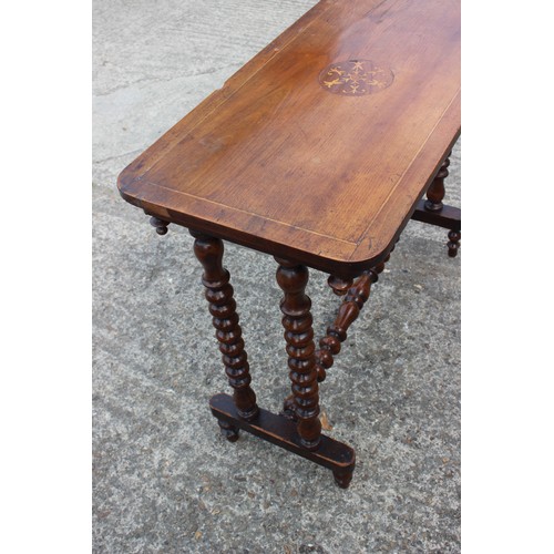 537 - A mahogany rectangular side table with box line and marquetry top, on bobbin turned stretchered supp... 