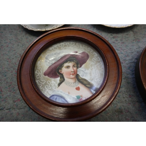 8 - A pair of 19th century French porcelain wall plates, women in period costume, 4