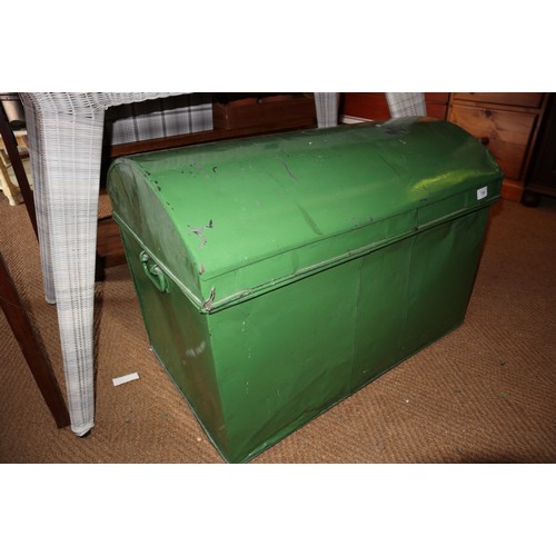 730 - A domed topped green painted tin trunk with carrying handles, 29 1/2