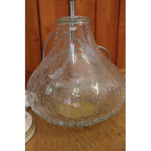 256 - A glass crackle effect bulbous table lamp, 11 3/4