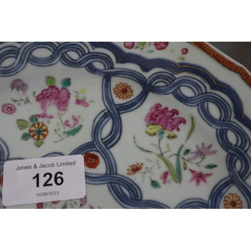 126 - Four Chinese famille rose shaped edge plates with floral spray and blue twisted decoration, 9