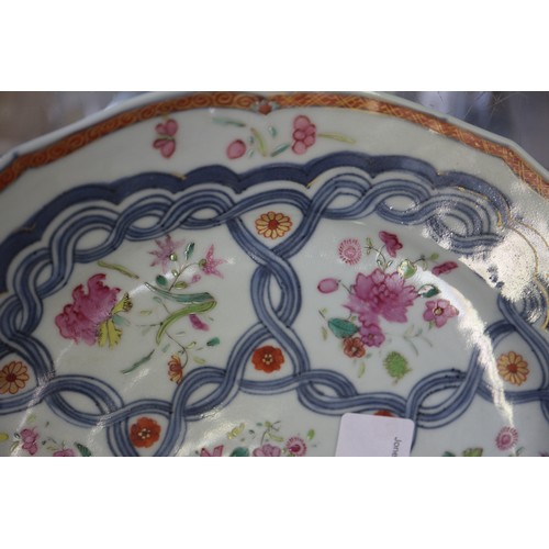 126 - Four Chinese famille rose shaped edge plates with floral spray and blue twisted decoration, 9