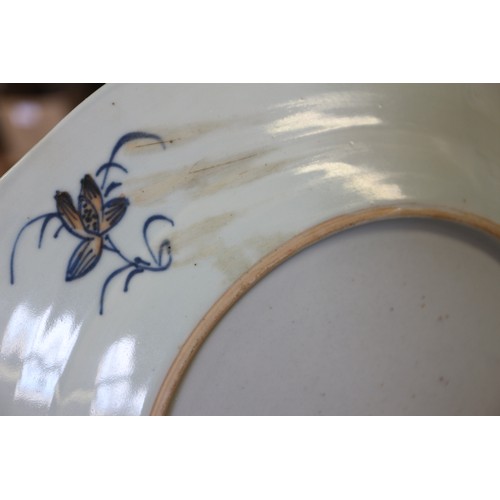 126 - Four Chinese famille rose shaped edge plates with floral spray and blue twisted decoration, 9