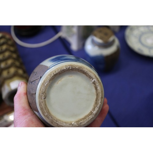 109 - A Chinese blue and white jardiniere with panelled precious object decoration, 8 3/4