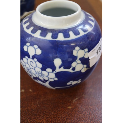 120 - Three Chinese blue and white ginger jars and covers with prunus decoration and double ring marks to ... 