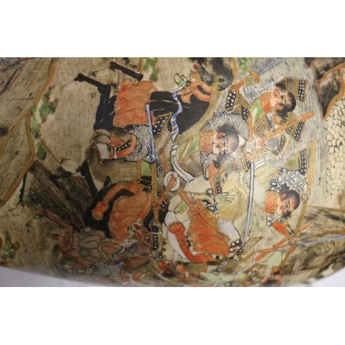 100 - A pair of Japanese Satsuma vases with panelled battle and figures in a landscape decoration and reli... 