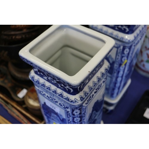 122 - A pair of Chinese blue and white square landscape decorated jars with seal marks to base, on stands,... 