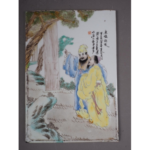 70 - *A Chinese porcelain plaque with figures in a landscape and verse decoration, 12 1/2