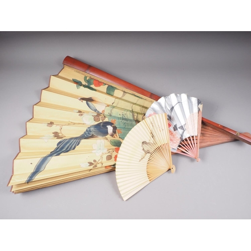 82 - A Japanese fan with painted bird and flower decoration, 34 3/4