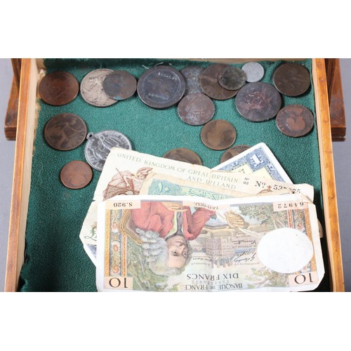 429 - A collector's coin chest, containing a selection of British and world coins