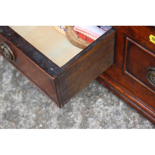 549 - A late Georgian quarter cut oak and mahogany banded corner hanging cupboard enclosed glazed panel do... 