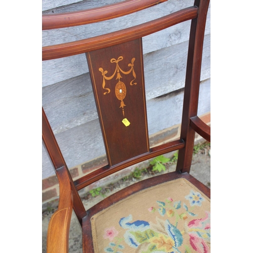 604 - A set of three Edwardian mahogany and inlaid salon chairs, on turned and stretchered supports (2+1),... 