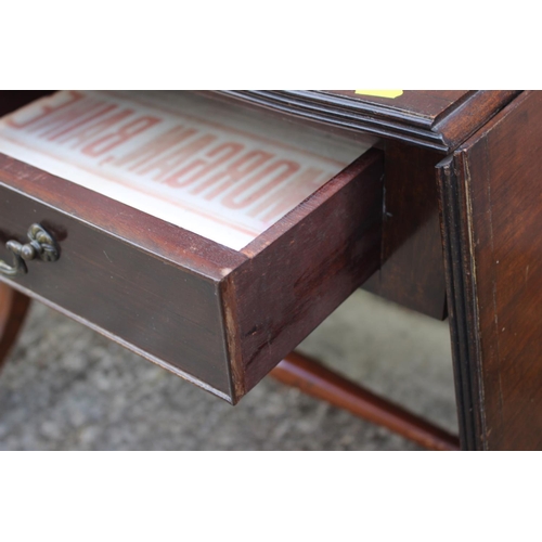 612 - A mahogany and banded sofa table, fitted two drawers, on shaped supports, 36