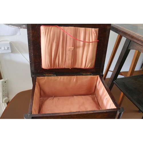 628 - A 1940s oak sewing box with silk lined interior, on slender supports, 13