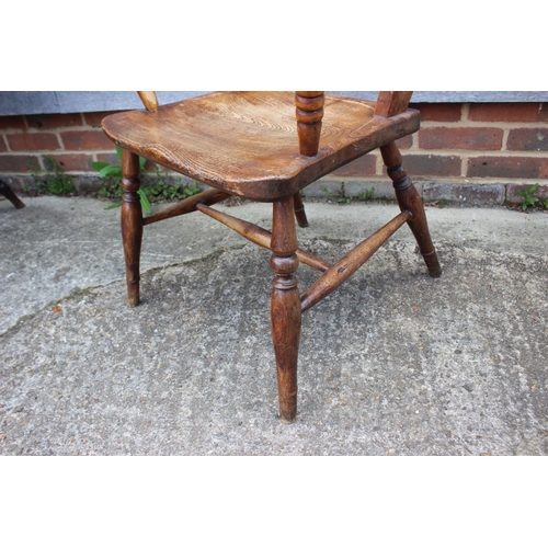 608 - A 19th century Oxford bar back elbow chair, on turned and stretchered supports