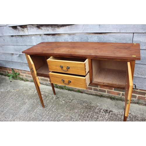 659 - A mahogany sideboard/carving table, fitted two centre drawers with flanking cupboards, on square tap... 