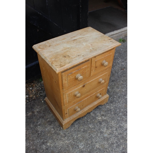 682 - A waxed pine bedside chest of two small and two long drawers, on bracket feet, 18