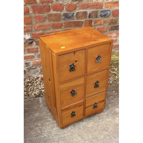 685 - A waxed pine chest of six drawers with wrought iron handles, 14 1/2