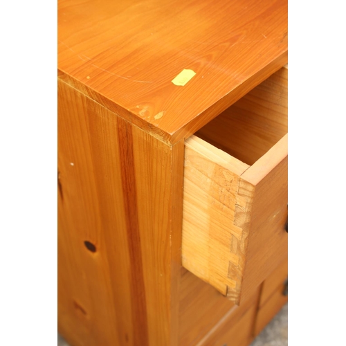 685 - A waxed pine chest of six drawers with wrought iron handles, 14 1/2