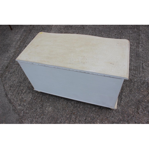 697 - A crackle painted serpentine front blanket box with fall front and lift-up lid, 37