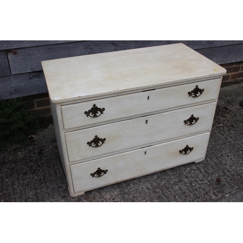 698 - A white painted chest of three long drawers with brass handles, 37 1/2