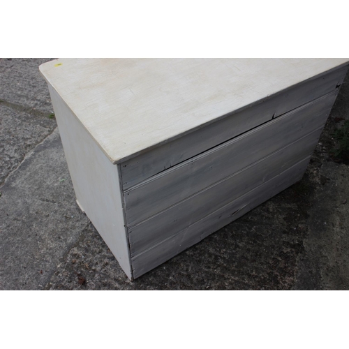 698 - A white painted chest of three long drawers with brass handles, 37 1/2